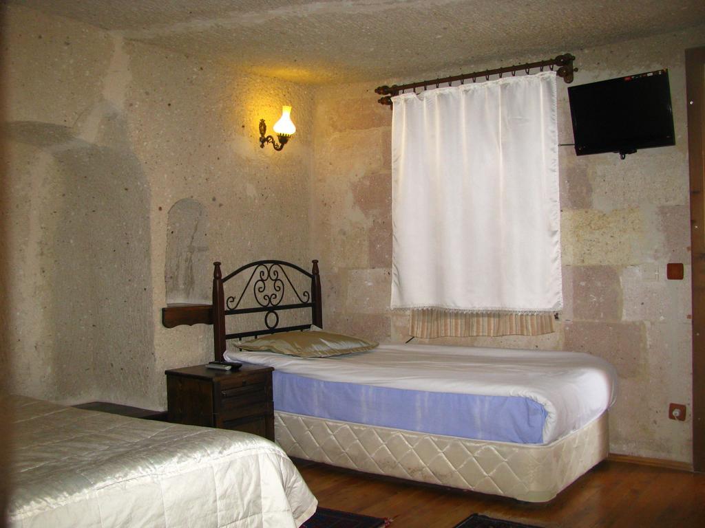 Nature Park Cave Hotel Гьореме Стая снимка
