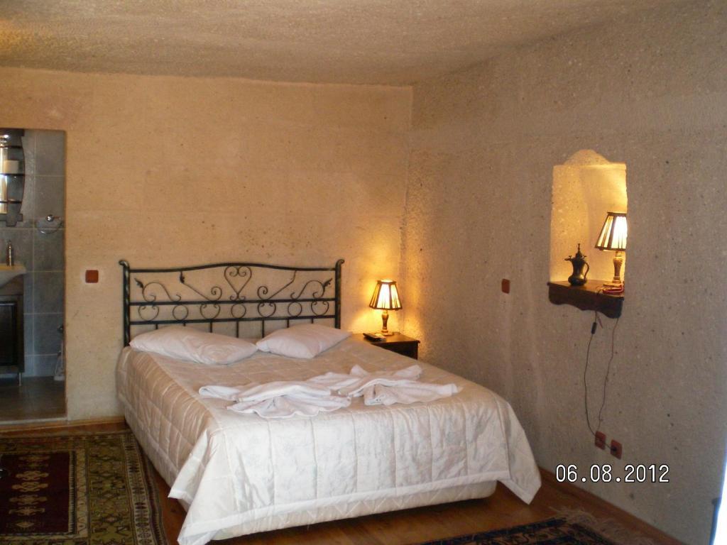 Nature Park Cave Hotel Гьореме Стая снимка